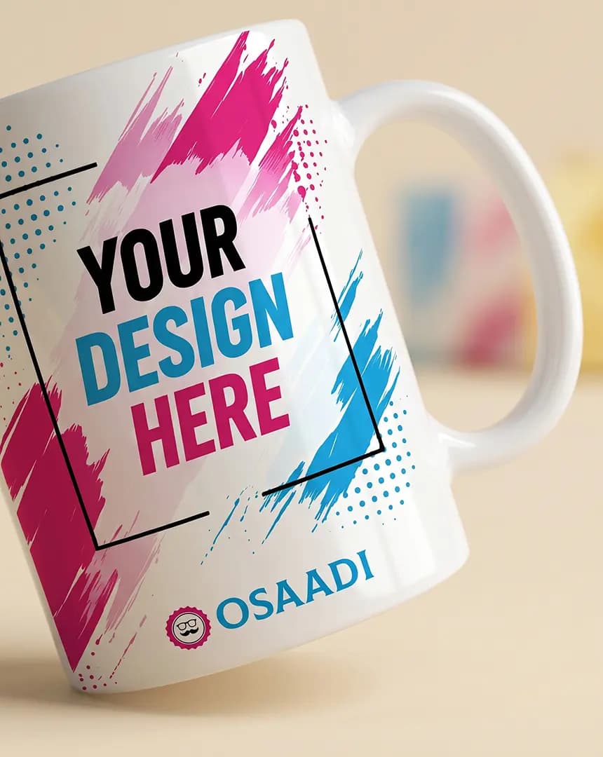 Close-up of colourful custom artwork following the glossy surface of a white mug.